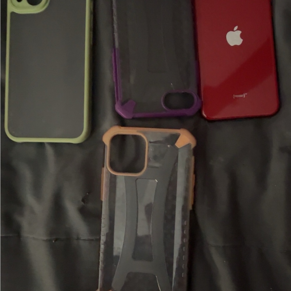 Apple iPhone Red with Black and Green Cases